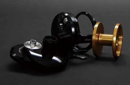 COLD FORGED, MACHINED ALUMINUM SPOOL, FRAME AND SIDE PLATE